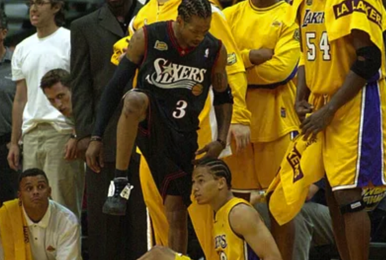 Allen Iverson steps over Tyronn Lue during the 2001 NBA Finals