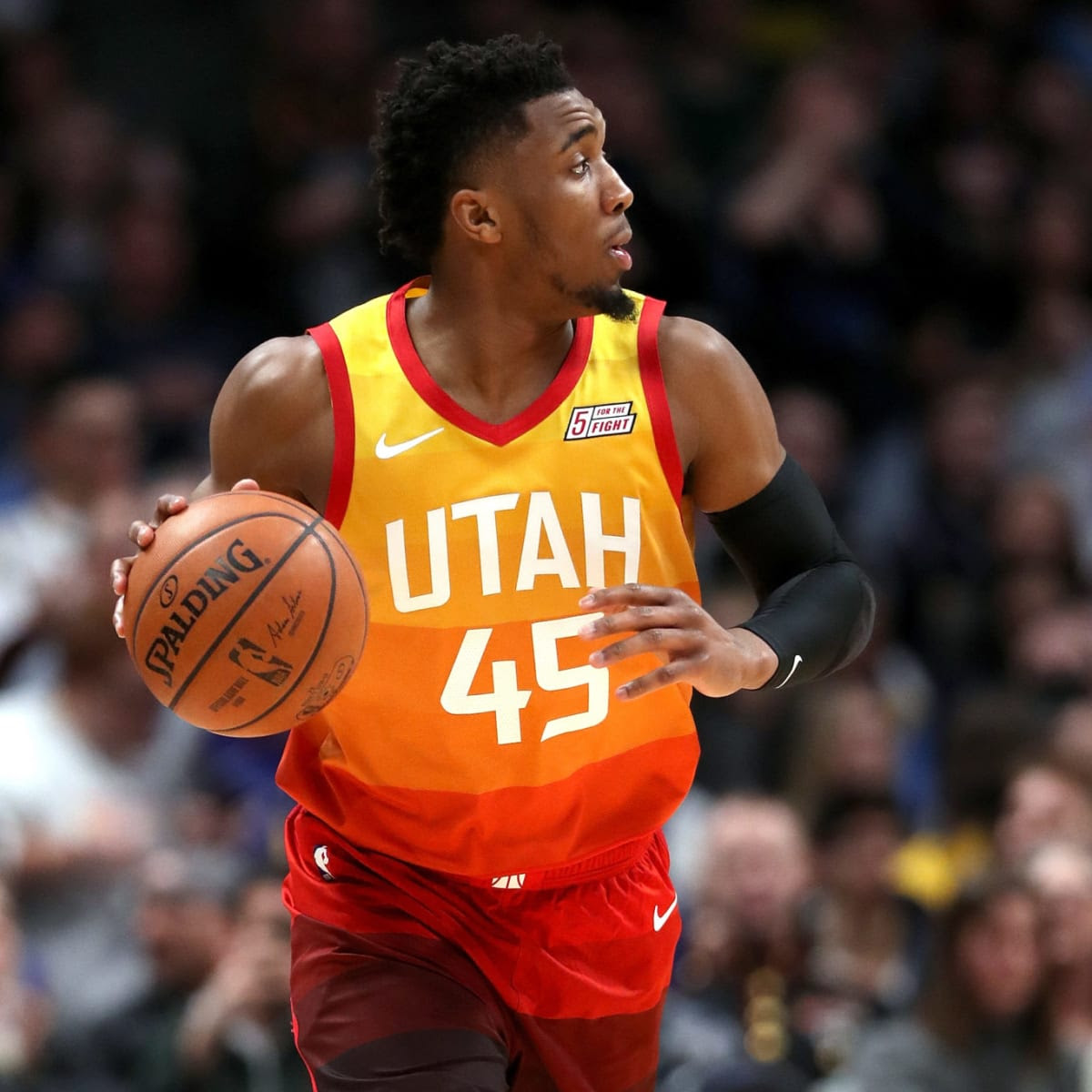 Donovan Mitchell with the desert color Utah Jazz jersey