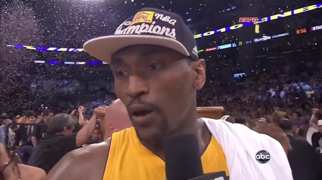 Ron Artest wearing a championship hat after winning the 2010 NBA Finals.