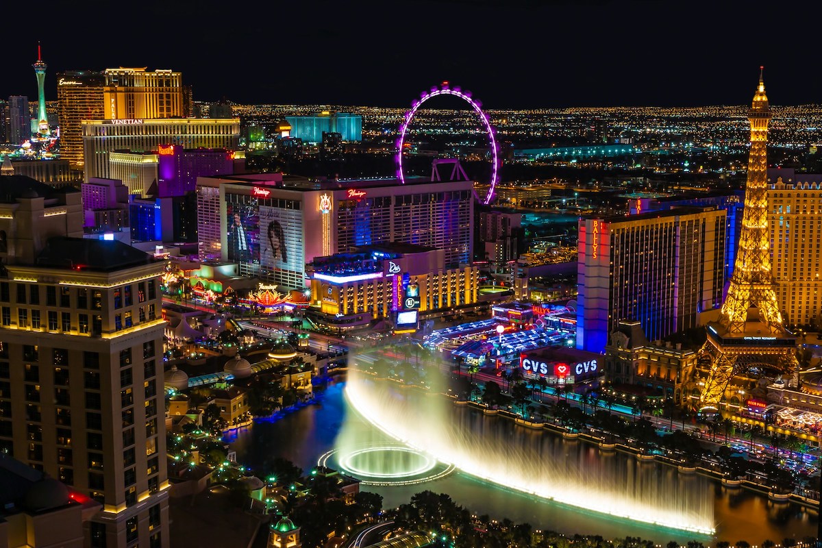 A skyline view of Las Vegas at night. Everything is lit up.