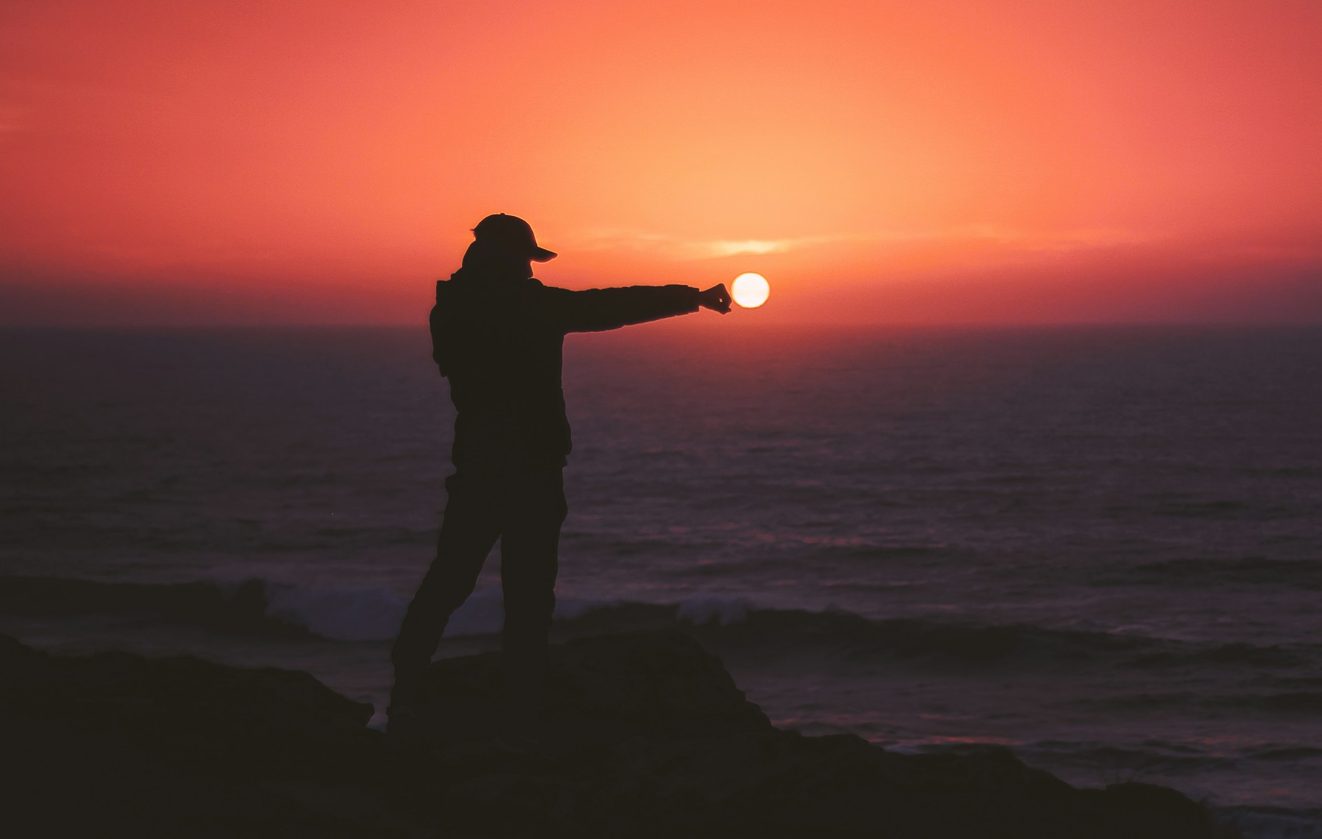 A Man Punching the Sun